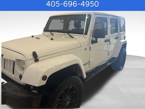 Used 2012 Jeep Wrangler Unlimited Sahara AWD/4WD image 1