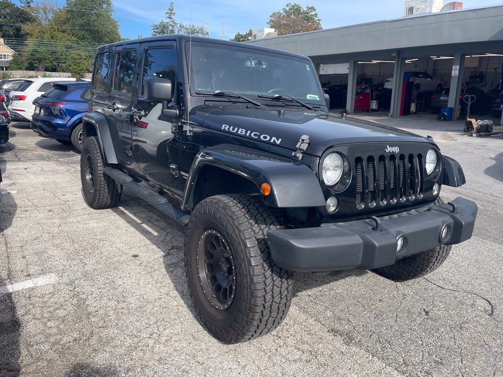 Used 2015 Jeep Wrangler Unlimited Rubicon w/ Dual Top Group AWD/4WD image 1
