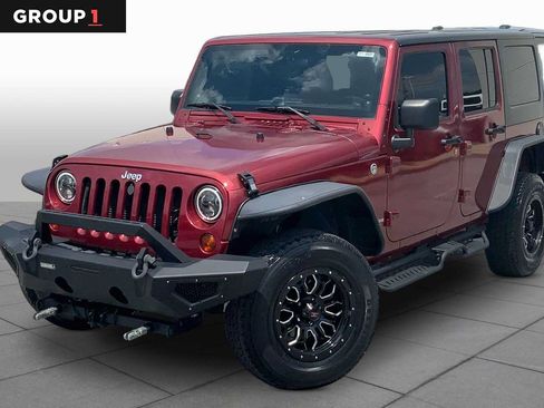 Used 2012 Jeep Wrangler Unlimited Sport AWD/4WD image 1