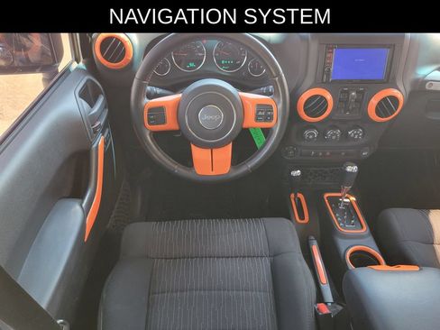 Used 2012 Jeep Wrangler Unlimited Sahara w/ Dual Top Group AWD/4WD image 8