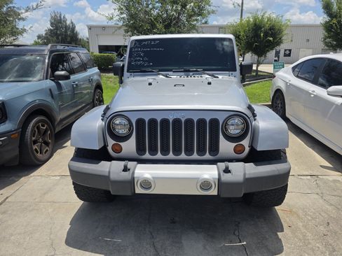 Used 2013 Jeep Wrangler Unlimited Sahara w/ Dual Top Group AWD/4WD image 2