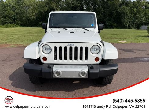 Used 2012 Jeep Wrangler Unlimited Sahara w/ Connectivity Group AWD/4WD image 1