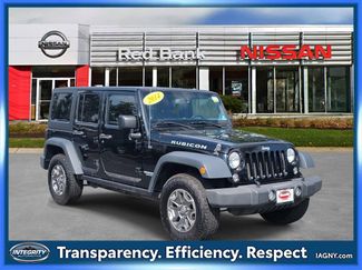 Used 2014 Jeep Wrangler Unlimited Rubicon w/ Dual Top Group image 1