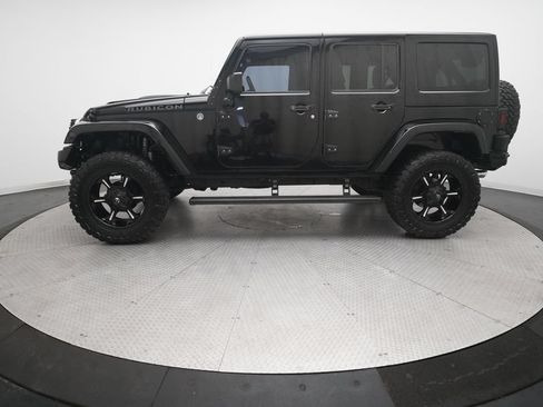 Used 2014 Jeep Wrangler Unlimited Rubicon w/ Dual Top Group AWD/4WD image 22