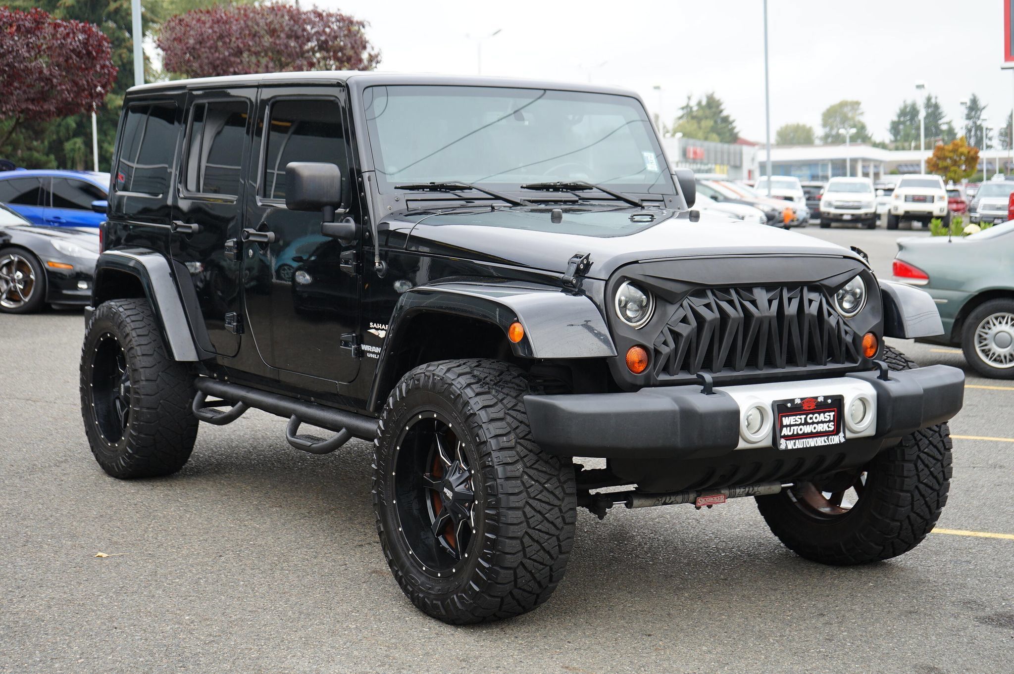 Used 2013 Jeep Wrangler Unlimited Sahara w/ Dual Top Group AWD/4WD image 7