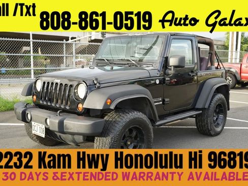 Used 2013 Jeep Wrangler Sport image 1