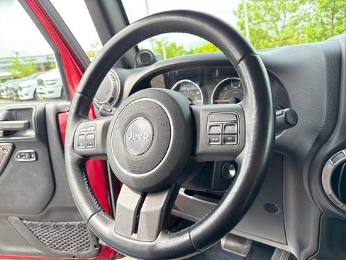 Used 2012 Jeep Wrangler Unlimited Sport AWD/4WD image 17