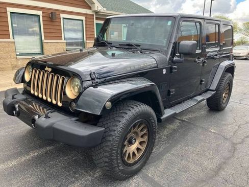 Used 2014 Jeep Wrangler Unlimited Sahara AWD/4WD image 8