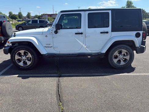 Used 2017 Jeep Wrangler Unlimited Sahara w/ Dual Top Group AWD/4WD image 2