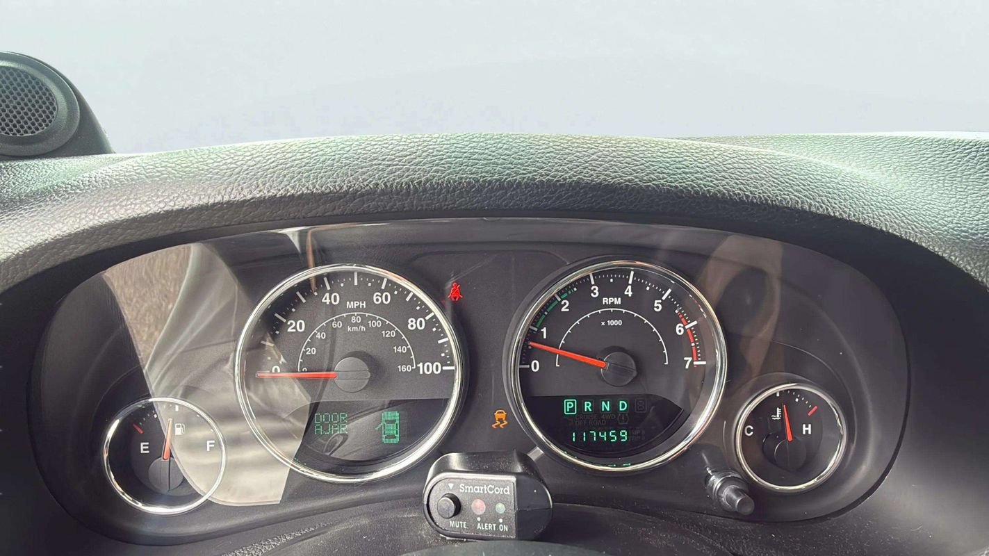 Used 2011 Jeep Wrangler Unlimited Sahara w/ Dual Top Group AWD/4WD image 12