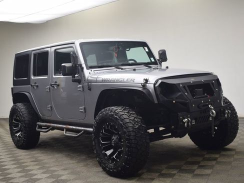 Used 2016 Jeep Wrangler Unlimited Sport image 1