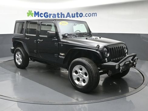Used 2014 Jeep Wrangler Unlimited Sahara w/ Dual Top Group AWD/4WD image 2