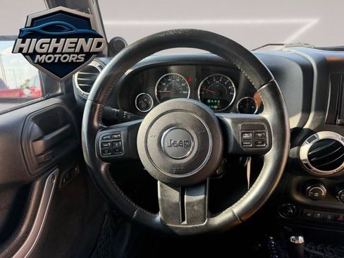 Used 2014 Jeep Wrangler Unlimited Rubicon w/ Dual Top Group AWD/4WD image 17
