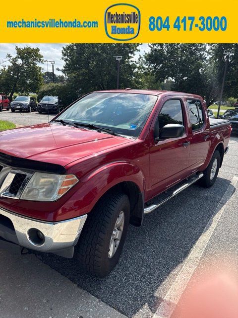 Used 2011 Nissan Frontier SV w/ SV Premium Utility Pkg AWD/4WD image 1