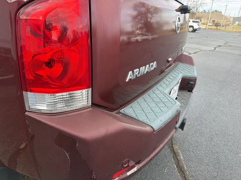 Used 2011 Nissan Armada Platinum w/ 2nd Row Captain Seat Pkg image 16