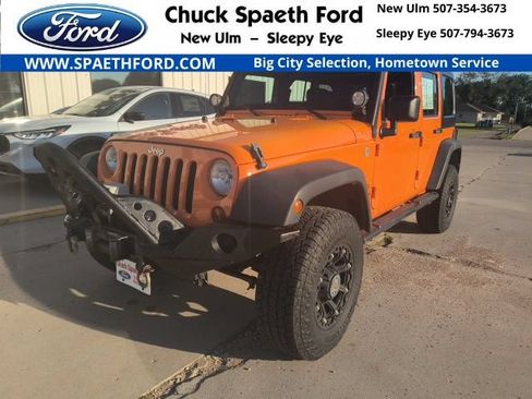 Used 2012 Jeep Wrangler Unlimited Sport w/ Black Appearance Group AWD/4WD image 1