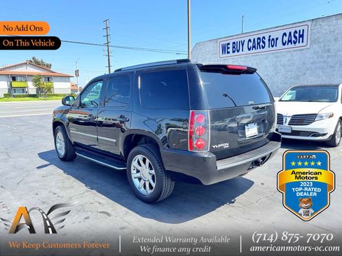 Used 2011 GMC Yukon Denali RWD image 1