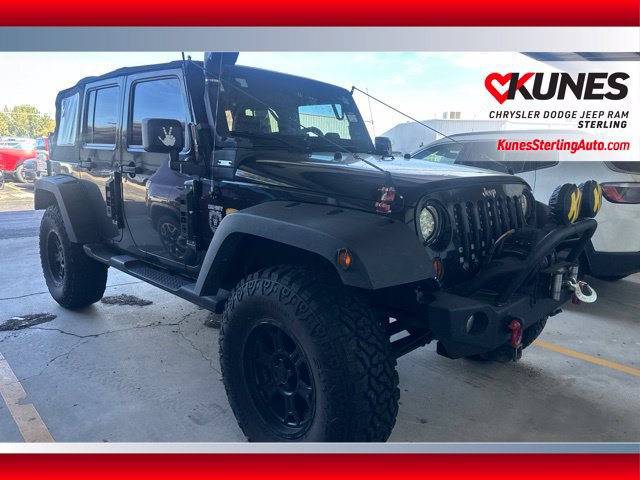 Used 2007 Jeep Wrangler Unlimited Sahara w/ Dual Top Group AWD/4WD image 1