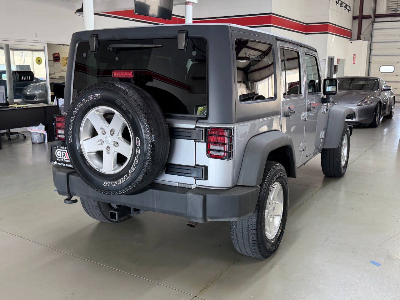 Used 2013 Jeep Wrangler Unlimited Sport AWD/4WD image 2