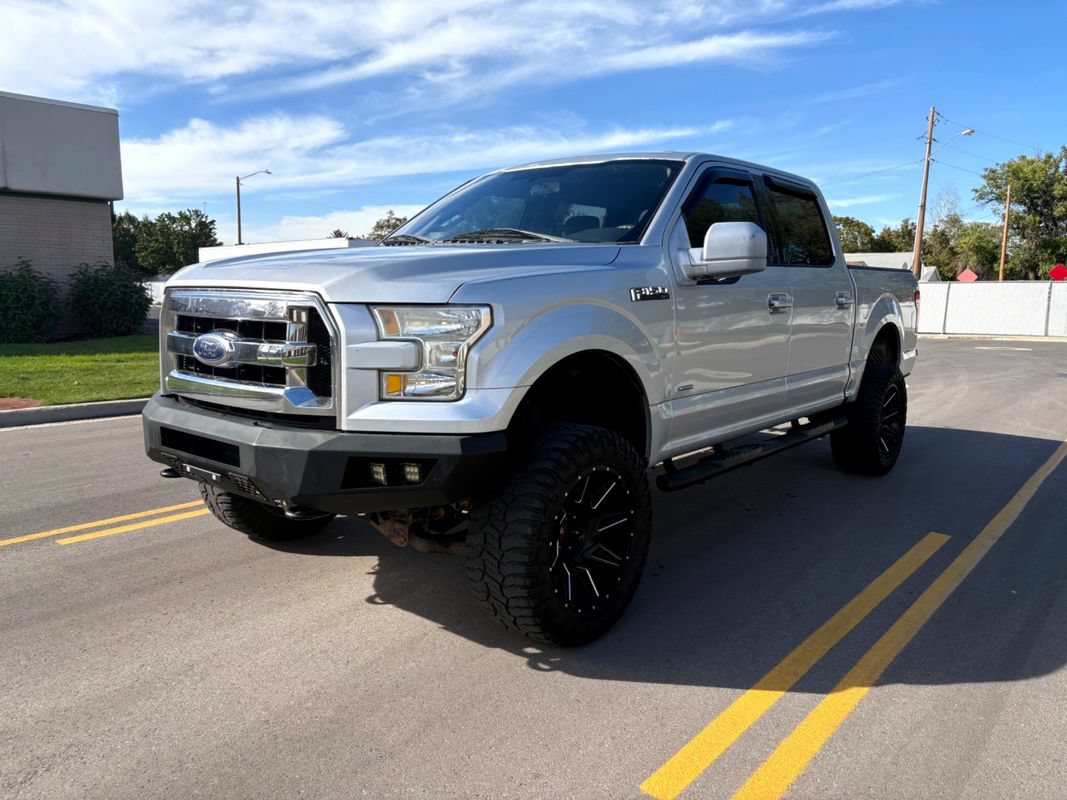 Used 2015 Ford F150 XLT AWD/4WD image 1