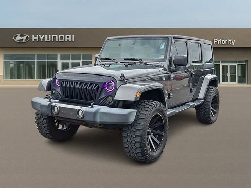 Used 2016 Jeep Wrangler Unlimited Sahara w/ Connectivity Group AWD/4WD image 1