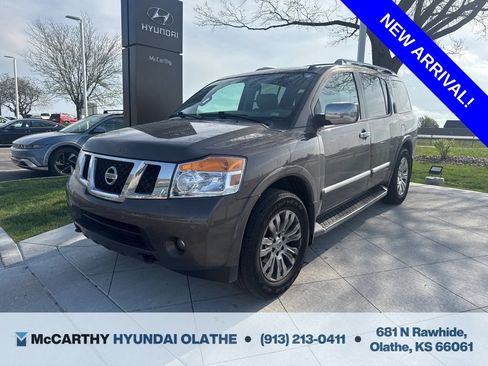 Used 2015 Nissan Armada Platinum w/ 2nd Row Captain Seat Package AWD/4WD image 1