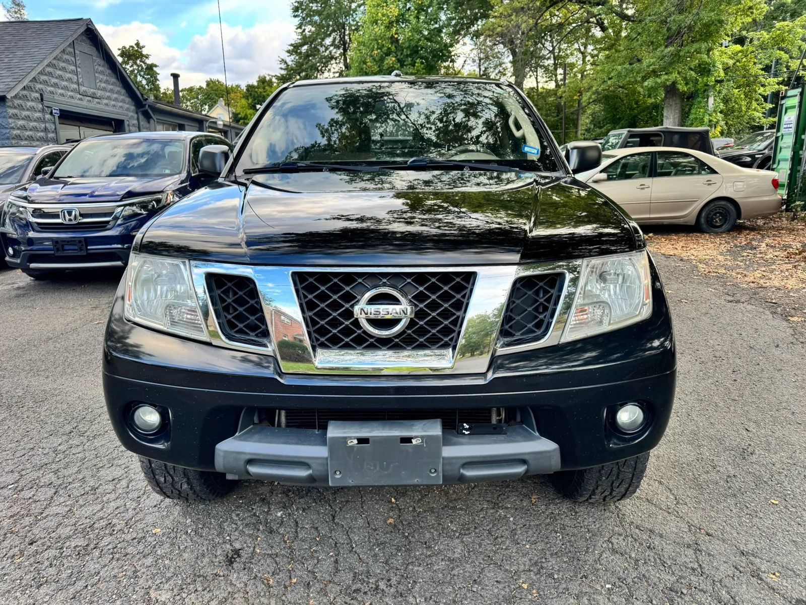 Used 2014 Nissan Frontier SV w/ SV Value Truck Package AWD/4WD image 2