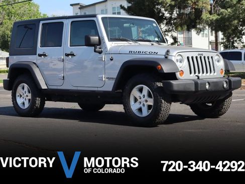 Used 2007 Jeep Wrangler Unlimited Rubicon w/ Dual Top Group AWD/4WD image 1