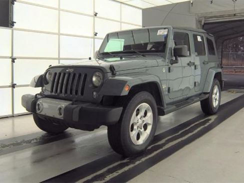 Used 2014 Jeep Wrangler Unlimited Sahara w/ Connectivity Group image 1
