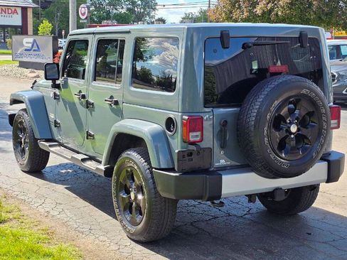 Used 2014 Jeep Wrangler Unlimited Sahara w/ Dual Top Group AWD/4WD image 4
