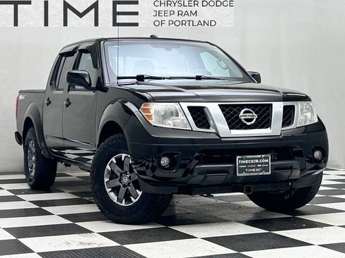 Used 2014 Nissan Frontier PRO-4X image 1