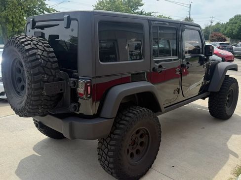 Used 2014 Jeep Wrangler Unlimited Rubicon w/ Dual Top Group AWD/4WD image 3