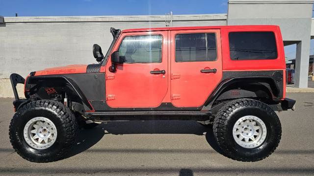 Used 2013 Jeep Wrangler Unlimited Sahara AWD/4WD image 8