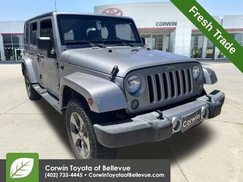 Used 2016 Jeep Wrangler Unlimited Sahara w/ Dual Top Group AWD/4WD image 1