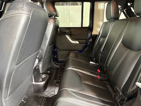 Used 2013 Jeep Wrangler Unlimited Sahara w/ Dual Top Group AWD/4WD image 36