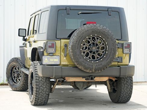 Used 2013 Jeep Wrangler Unlimited Sport w/ Mopar Black Appearance Group image 5