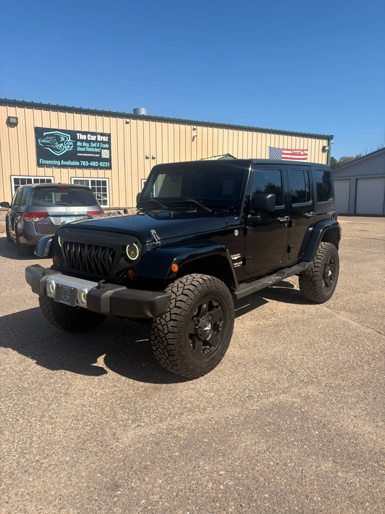 Used 2013 Jeep Wrangler Unlimited Sahara AWD/4WD image 1