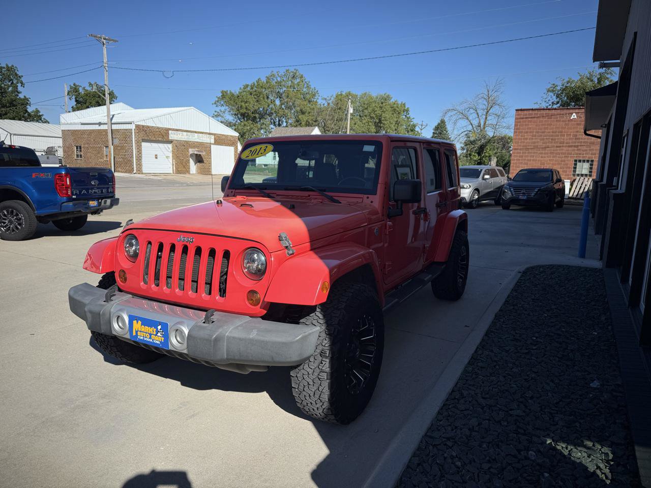Used 2013 Jeep Wrangler Unlimited Sahara w/ Dual Top Group AWD/4WD image 3