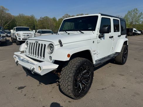 Used 2016 Jeep Wrangler Unlimited Sahara w/ Max Tow Package AWD/4WD image 1