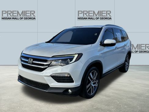 Used 2016 Honda Pilot Touring image 1
