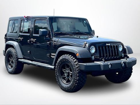 Used 2016 Jeep Wrangler Unlimited Sport w/ Mopar Black Appearance Group AWD/4WD image 11