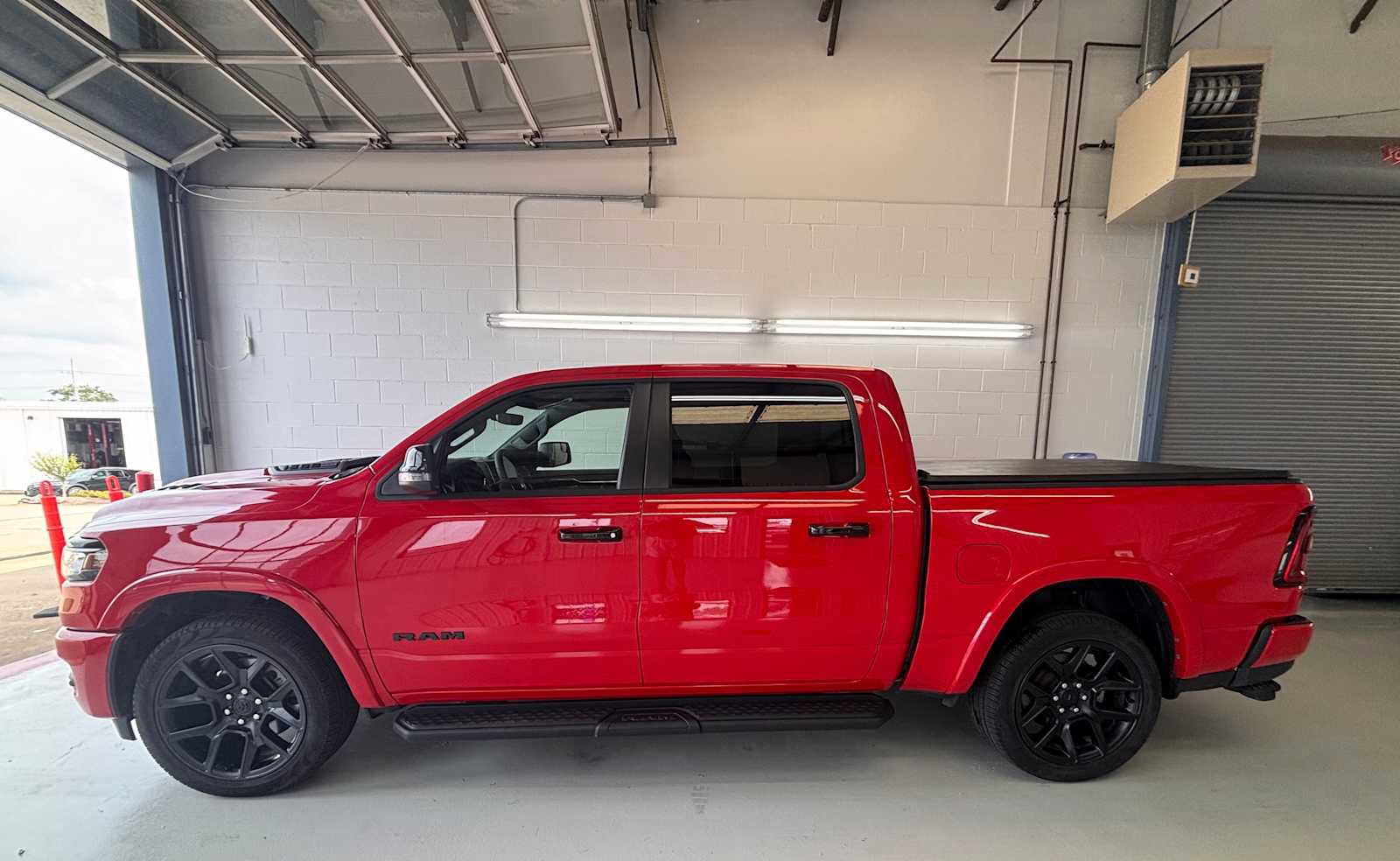 Used 2025 RAM 1500 Laramie w/ Night Edition AWD/4WD image 1