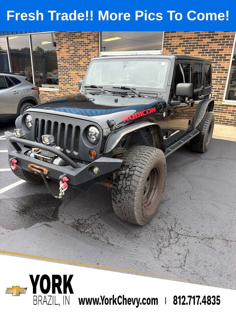 Used 2011 Jeep Wrangler Unlimited Rubicon w/ Dual Top Group AWD/4WD image 1