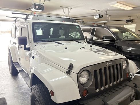 Used 2013 Jeep Wrangler Unlimited Freedom Edition image 1