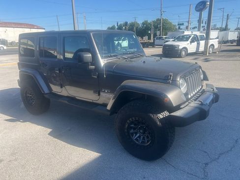 Used 2016 Jeep Wrangler Unlimited Sahara w/ Connectivity Group image 1
