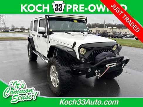 Used 2016 Jeep Wrangler Unlimited Sahara w/ Dual Top Group image 1