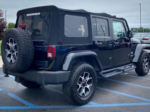 Used 2013 Jeep Wrangler Unlimited Sahara w/ Dual Top Group AWD/4WD image 8
