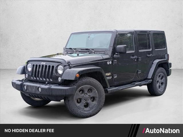Used 2014 Jeep Wrangler Unlimited Sahara AWD/4WD image 1