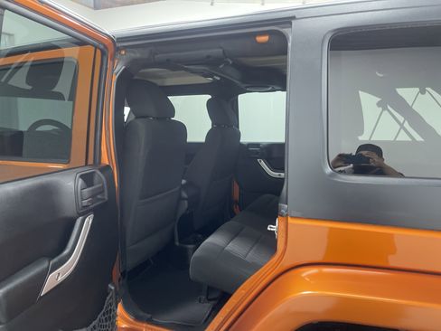 Used 2011 Jeep Wrangler Unlimited Sahara w/ Dual Top Group AWD/4WD image 13