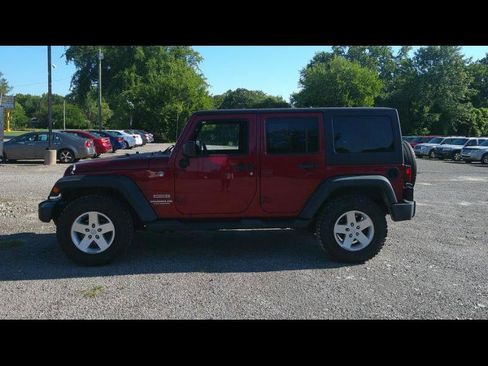 Used 2012 Jeep Wrangler Unlimited Sport AWD/4WD image 1
